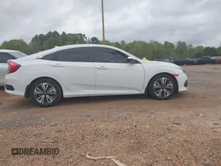 2017 Honda Civic EX-L with VIN 2HGFC1F72HH658763, listed as a IAAI auction lot 41972317 with 166,168 mi miles and . Bid and sale history available at DreamBid. Image 14.