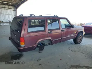 2000 Jeep Cherokee Classic with VIN 1J4FF58S8YL135534, listed as a Copart auction lot 62211335 with 108,888 mi miles and Salvage title. Bid and sale history available at DreamBid. Image 3.