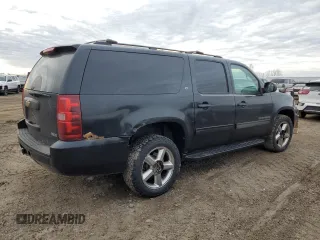 2011 Chevrolet Suburban LT with VIN 1GNSKJE33BR389346, listed as a Copart auction lot 48250195 with 217,815 mi miles and Salvage Title. Bid and sale history available at carsss.com. Image 3.