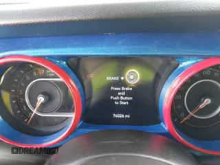 2020 Jeep Wrangler Unlimited Sport S with VIN 1C4HJXDG4LW221778, listed as a IAAI auction lot 41441662 with 76,026 mi miles and . Bid and sale history available at DreamBid. Image 7.