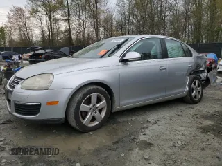 2009 Volkswagen Jetta SE z VIN 3VWRM71K39M140264, wystawiony jako Copart lot #52645605 z przebiegiem 194 817 mil mil oraz Szkoda całkowita • Salvage title. Historia ofert i sprzedaży dostępna na DreamBid. Obrazek 1.