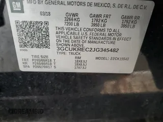 2018 Chevrolet Silverado 1500 LT with VIN 3GCUKREC2JG345482, listed as a Copart auction lot 52452445 with 100,824 mi miles and Salvage Title. Bid and sale history available at DreamBid. Image 13.