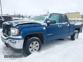 2019 GMC Sierra 1500 Limited SLE with VIN 2GTV2MEC5K1100841, listed as a IAAI auction lot 41558266 with 66,988 mi miles. Bid and sale history available at carsss.com. Image 2.