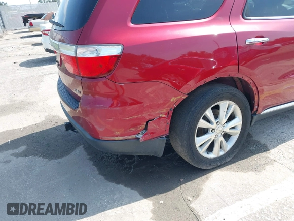 2013 Dodge Durango Crew z VIN 1C4RDJDG6DC672934, wystawiony jako IAAI lot #42542073 z przebiegiem 181 812 mil mil oraz . Historia ofert i sprzedaży dostępna na DreamBid. Obrazek 6.