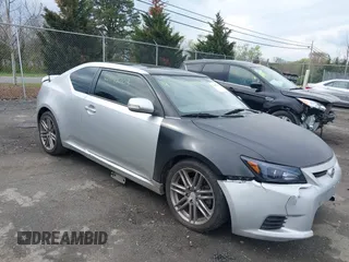 2012 Scion tC with VIN JTKJF5C73C3039072, listed as a IAAI auction lot 42042203 with 232,488 mi miles. Bid and sale history available at carsss.com. Image 1.