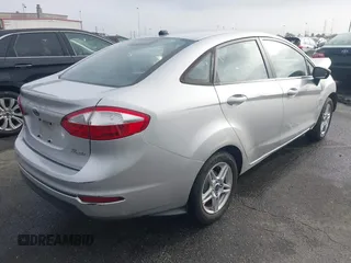 2017 Ford Fiesta SE with VIN 3FADP4BJXHM116900, listed as a IAAI auction lot 41815656 with 74,662 mi miles and . Bid and sale history available at DreamBid. Image 4.