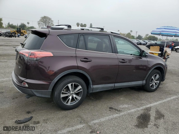 2016 Toyota RAV4 XLE with VIN 2T3WFREV2GW297912, listed as a Copart auction lot 53116605 with 33,155 mi miles and Salvage Title. Bid and sale history available at carsss.com. Image 3.