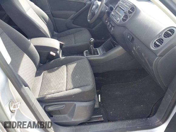 2012 Volkswagen Tiguan with VIN WVGCV7AX6CW589605, listed as a IAAI auction lot 41916090 with 123,223 mi miles and . Bid and sale history available at DreamBid. Image 5.