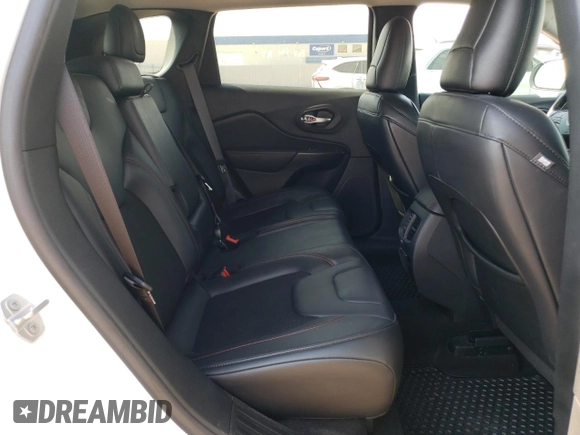 2020 Jeep Cherokee Trailhawk Elite z VIN 1C4PJMBN3LD537812, wystawiony jako Copart lot #73635994 z przebiegiem 43 496 mil mil oraz Czysty tytuł • Clean title. Historia ofert i sprzedaży dostępna na DreamBid. Obrazek 11.