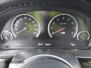 2016 BMW M5 z VIN WBSFV9C54GD595793, wystawiony jako IAAI lot #42101121 z przebiegiem 58 775 mil mil oraz . Historia ofert i sprzedaży dostępna na DreamBid. Obrazek 7.