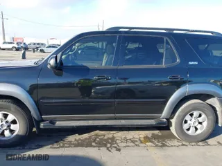 2004 Toyota Sequoia SR5 with VIN 5TDZT34A74S237767, listed as a IAAI auction lot 41499624 with 144,574 mi miles. Bid and sale history available at carsss.com. Image 14.