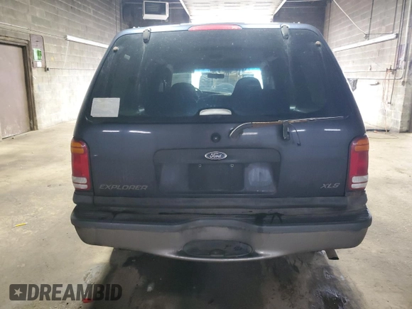 2000 Ford Explorer XLS z VIN 1FMZU72X7YUA71727, wystawiony jako Copart lot #51416935 z przebiegiem 163 005 mil mil oraz Szkoda całkowita • Salvage title. Historia ofert i sprzedaży dostępna na DreamBid. Obrazek 6.