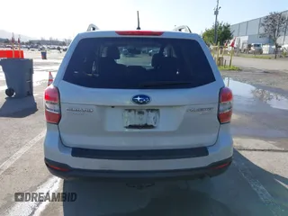 2014 Subaru Forester Premium z VIN JF2SJAEC1EH449132, wystawiony jako IAAI lot #41799339 z przebiegiem 140 591 mil mil oraz . Historia ofert i sprzedaży dostępna na DreamBid. Obrazek 16.