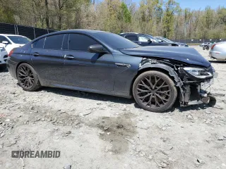 2016 BMW M6 with VIN WBS6E9C5XGG437084, listed as a Copart auction lot 53632315 with 108,151 mi miles and Salvage title. Bid and sale history available at DreamBid. Image 4.