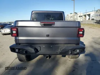 2021 Jeep Gladiator Rubicon с VIN 1C6JJTBM4ML594204, выставлен на аукционе Copart как лот 83998224 с пробегом 25 852 миль миль и Списание • Salvage title. История ставок и продаж доступна на DreamBid. Изображение 6.