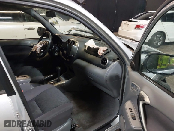 2001 Toyota RAV4 with VIN JTEHH20V410059276, listed as a IAAI auction lot 42473915 with 145,627 mi miles and . Bid and sale history available at DreamBid. Image 5.