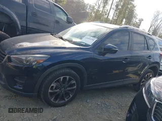 2016 Mazda CX-5 Grand Touring with VIN JM3KE2DY1G0708572, listed as a IAAI auction lot 41685298 with 109,427 mi miles. Bid and sale history available at carsss.com. Image 14.