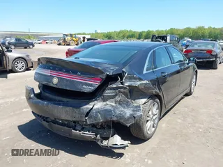 2015 Lincoln MKZ with VIN 3LN6L2J96FR625761, listed as a IAAI auction lot 42235387 with 132,183 mi miles and . Bid and sale history available at DreamBid. Image 4.