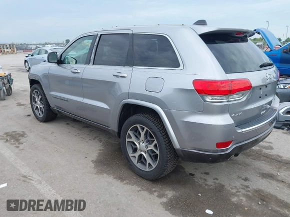 2018 Jeep Grand Cherokee Limited with VIN 1C4RJFBG7JC266715, listed as a IAAI auction lot 42562005 with 101,999 mi miles and . Bid and sale history available at DreamBid. Image 3.