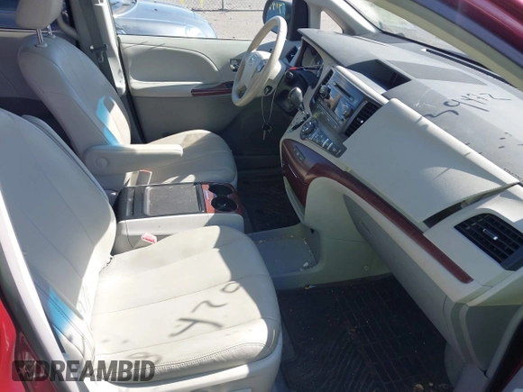 2014 Toyota Sienna XLE with VIN 5TDYK3DC8ES457940, listed as a IAAI auction lot 42039472 with 99,769 mi miles and . Bid and sale history available at DreamBid. Image 5.