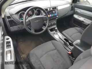 2010 Chrysler Sebring Touring z VIN 1C3BC5ED9AN181987, wystawiony jako Copart lot #53142775 z przebiegiem 162 951 mil mil oraz Szkoda całkowita • Salvage title. Historia ofert i sprzedaży dostępna na DreamBid. Obrazek 8.