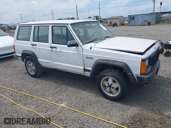 1993 Jeep Cherokee z VIN 1J4FT28PXPL560996, wystawiony jako IAAI lot #42526590 z przebiegiem 304 201 mil mil oraz . Historia ofert i sprzedaży dostępna na DreamBid. Obrazek 1.