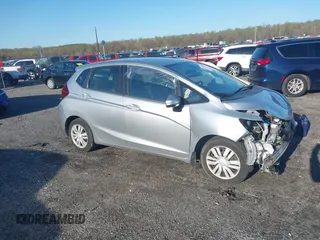 2016 Honda Fit LX with VIN JHMGK5H54GX007250, listed as a IAAI auction lot 41987205 with 50,174 mi miles. Bid and sale history available at carsss.com. Image 13.