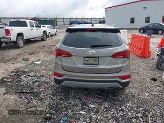 2018 Hyundai Santa Fe 2.4L with VIN 5NMZU3LB1JH100507, listed as a IAAI auction lot 42182116 with 103,826 mi miles and . Bid and sale history available at DreamBid. Image 16.
