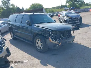 2003 GMC Yukon XL Denali with VIN 1GKFK66U43J302153, listed as a IAAI auction lot 41217747 with 198,228 mi miles. Bid and sale history available at carsss.com. Image 1.