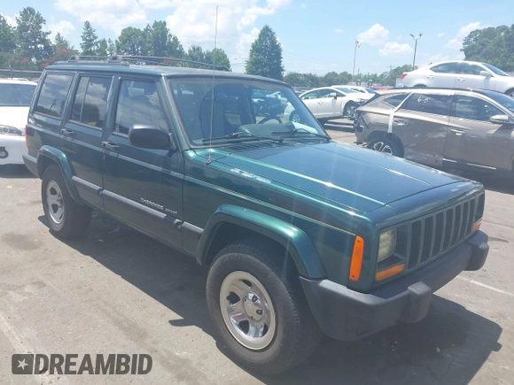 2000 Jeep Cherokee z VIN 1J4FT48S7YL134491, wystawiony jako IAAI lot #42789305 z przebiegiem 180 886 mil mil oraz . Historia ofert i sprzedaży dostępna na DreamBid. Obrazek 1.
