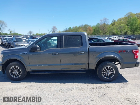 2018 Ford F-150 XL with VIN 1FTEW1EG2JFE55513, listed as a IAAI auction lot 41530354 with 132,617 mi miles. Bid and sale history available at carsss.com. Image 14.