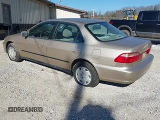 2000 Honda Accord LX z VIN 1HGCG1644YA057186, wystawiony jako IAAI lot #41780299 z przebiegiem 153 612 mil mil oraz . Historia ofert i sprzedaży dostępna na DreamBid. Obrazek 3.