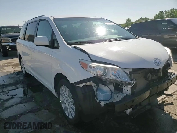 2015 Toyota Sienna LE with VIN 5TDJK3DC2FS126466, listed as a Copart auction lot 61165105 with 56,634 mi miles and Salvage title. Bid and sale history available at DreamBid. Image 15.