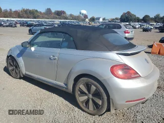 2013 Volkswagen Beetle 2.5L with VIN 3VW5P7ATXDM803952, listed as a Copart auction lot 76971934 with 211,449 mi miles and Salvage Title. Bid and sale history available at DreamBid. Image 2.