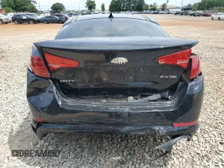 2013 Kia Optima EX с VIN 5XXGN4A76DG246591, выставлен на аукционе Copart как лот 60995845 с пробегом 179 314 миль миль и Списание • Salvage title. История ставок и продаж доступна на DreamBid. Изображение 6.