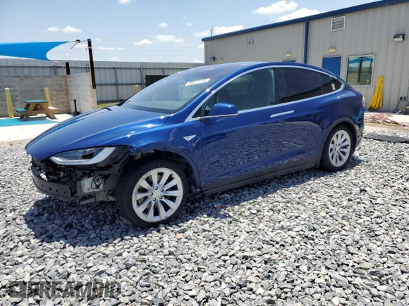 2016 Tesla Model X 70D z VIN 5YJXCAE29GF001522, wystawiony jako Copart lot #56571115 z przebiegiem 129 924 mil mil oraz Szkody całkowita. Historia ofert i sprzedaży dostępna na DreamBid. Obrazek 1.