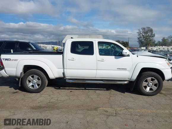 2015 Toyota Tacoma PreRunner with VIN 3TMKU4HN6FM044238, listed as a IAAI auction lot 41534623 with 196,490 mi miles and . Bid and sale history available at DreamBid. Image 13.