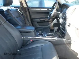 2009 Chrysler 300 LX with VIN 2C3KA43D69H565894, listed as a IAAI auction lot 41283079 with 233,098 mi miles. Bid and sale history available at carsss.com. Image 5.