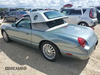2004 Ford Thunderbird Pacific Coast Roadster with VIN 1FAHP63A04Y108766, listed as a Copart auction lot 74766964 with 30,107 mi miles and Salvage Title. Bid and sale history available at DreamBid. Image 2.