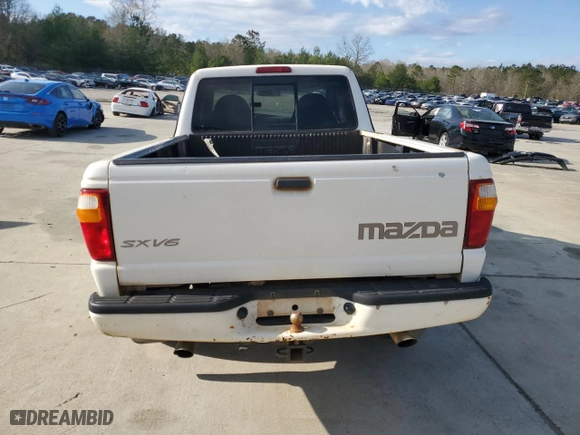 2001 Mazda B-Series 2WD Truck DS with VIN 4F4YR16U71TM18636, listed as a Copart auction lot 49143705 with 193,726 mi miles and Salvage Title. Bid and sale history available at carsss.com. Image 6.
