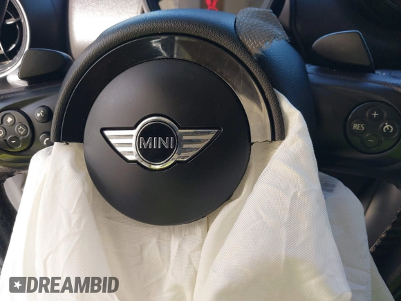 2015 MINI Countryman S with VIN WMWZC3C5XFWT06360, listed as a IAAI auction lot 40774863 with 127,383 mi miles and . Bid and sale history available at DreamBid. Image 6.