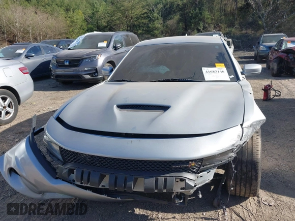2021 Dodge Charger Scat Pack with VIN 2C3CDXGJ5MH539860, listed as a IAAI auction lot 41683146 with 21,361 mi miles and . Bid and sale history available at DreamBid. Image 6.