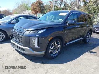 2024 Hyundai Palisade Limited z VIN KM8R5DGE2RU651701, wystawiony jako IAAI lot #41894978 z przebiegiem 38 461 mil mil oraz . Historia ofert i sprzedaży dostępna na DreamBid. Obrazek 2.
