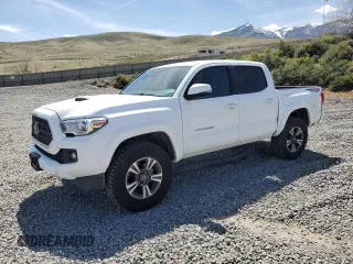 2019 Toyota Tacoma SR z VIN 3TMCZ5AN1KM263494, wystawiony jako Copart lot #54710695 z przebiegiem 57 216 mil mil oraz Szkody całkowita. Historia ofert i sprzedaży dostępna na DreamBid. Obrazek 1.