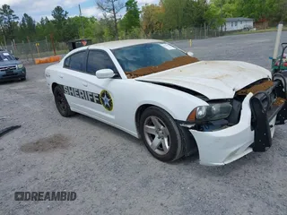 2014 Dodge Charger Police with VIN 2C3CDXAT0EH367703, listed as a IAAI auction lot 42014668 with 137,680 mi miles and . Bid and sale history available at DreamBid. Image 1.