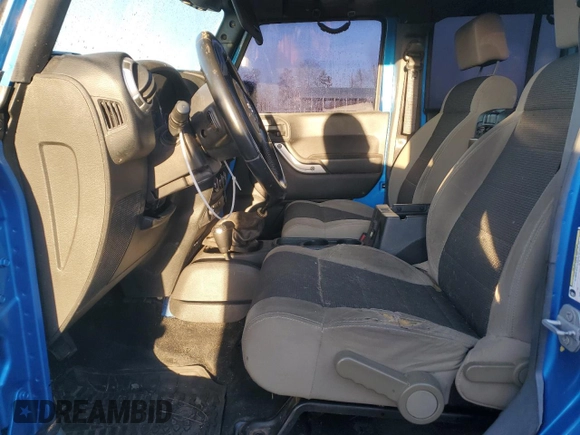 2015 Jeep Wrangler Unlimited Sahara с VIN 1C4BJWEG5FL586751, выставлен на аукционе Copart как лот 84089374 с пробегом 118 184 миль миль и Списание • Salvage title. История ставок и продаж доступна на DreamBid. Изображение 7.