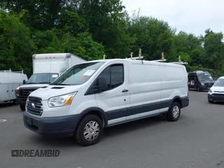 2016 Ford Transit Cargo z VIN 1FTYR2ZM6GKA03946, wystawiony jako IAAI lot #42590477 z przebiegiem 163 710 mil mil oraz . Historia ofert i sprzedaży dostępna na DreamBid. Obrazek 6.
