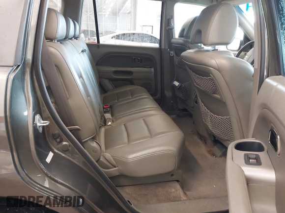 2006 Honda Pilot EX-L with VIN 5FNYF187X6B026463, listed as a IAAI auction lot 41612181 with 242,828 mi miles and . Bid and sale history available at DreamBid. Image 8.