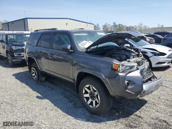 2021 Toyota 4Runner TRD Off Road with VIN JTEPU5JR0M5877962, listed as a Copart auction lot 50973355 with 61,539 mi miles and Salvage Title. Bid and sale history available at carsss.com. Image 4.