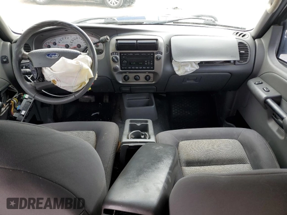 2005 Ford Explorer Sport Trac XLS с VIN 1FMZU77KX5UB67697, выставлен на аукционе Copart как лот 45185175 с пробегом 131 572 миль миль и На запчасти • Non repairable. История ставок и продаж доступна на DreamBid. Изображение 8.
